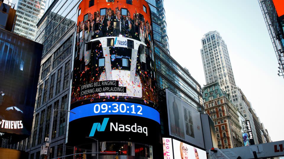 A screen displays the opening bell ceremony for information for semiconductor and chipmaker GlobalFoundries Inc. during the company's IPO at the Nasdaq MarketSite in Times Square in New York City, on October 28, 2021. - Brendan McDermid/Reuters