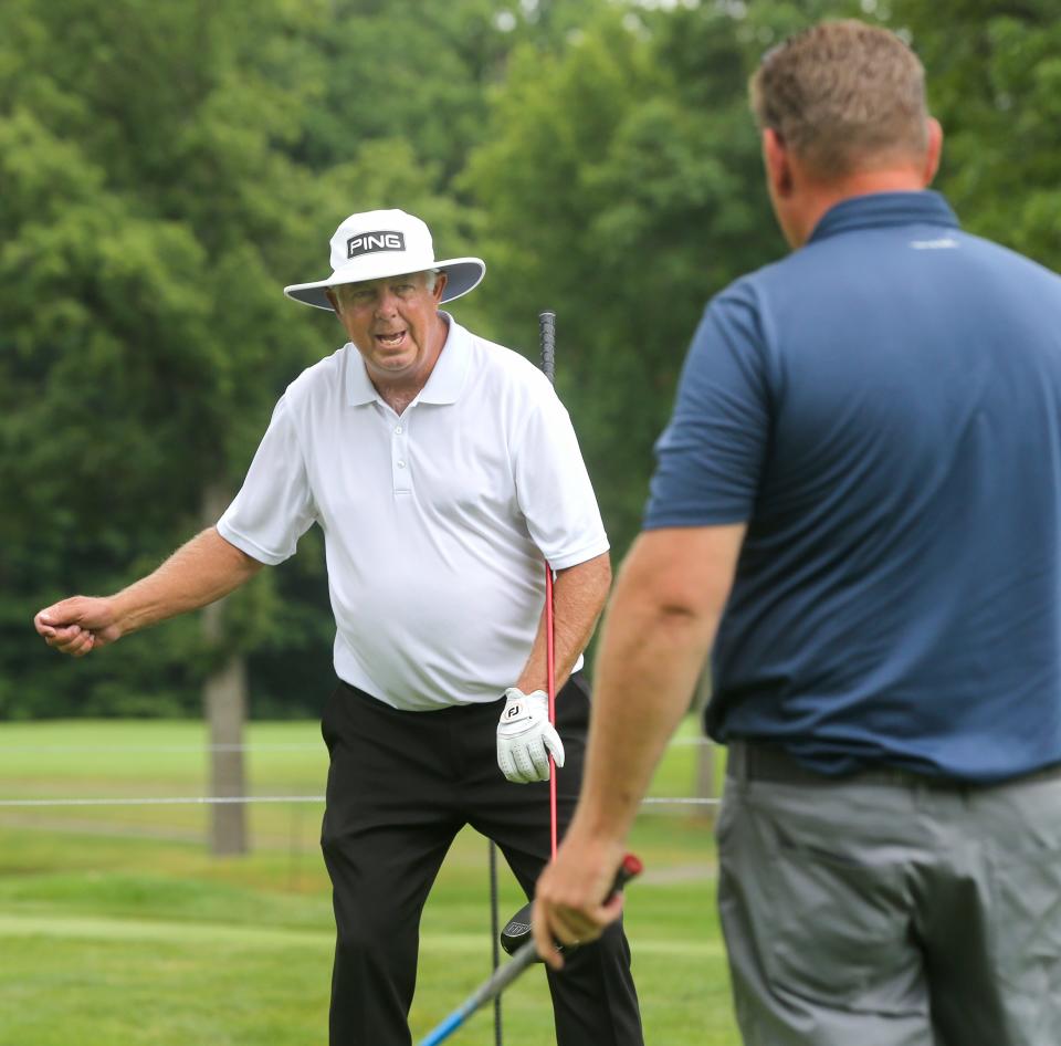 Kirk Triplett give a few tips to a member of his foursome during the Bridgestone Senior Players Championship Pro-Am on Wednesday at Firestone Country Club in Akron.