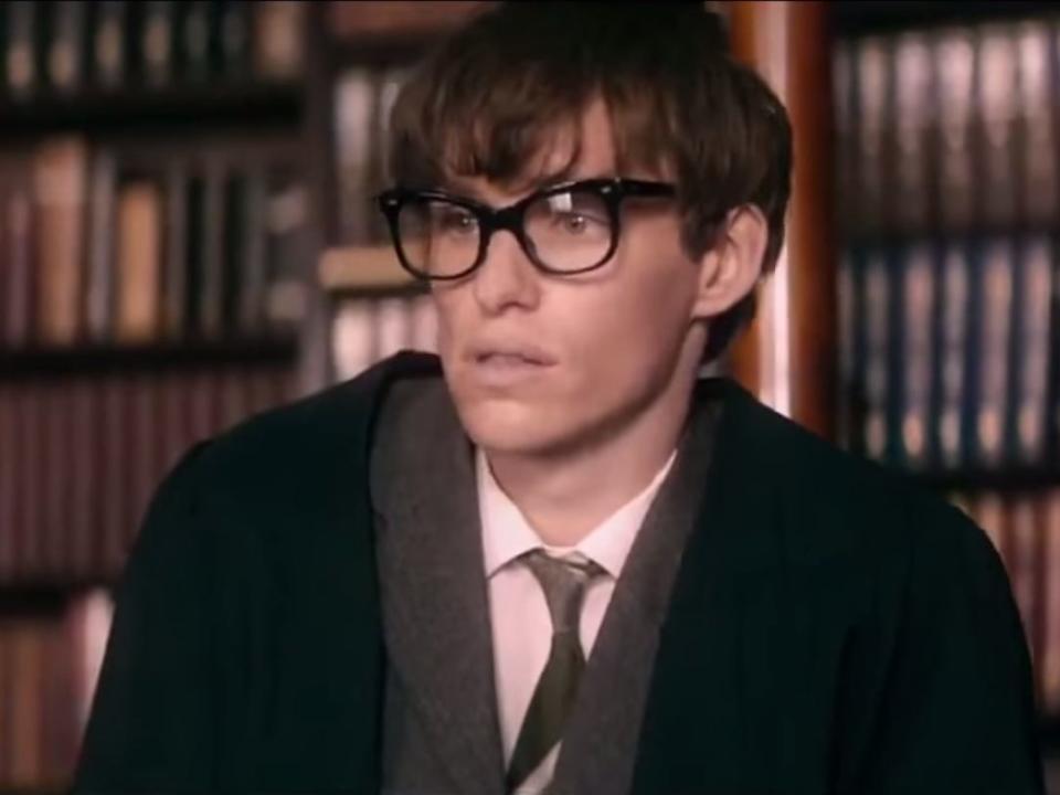 Eddie Redmayne as Stephen Hawking with glasses on