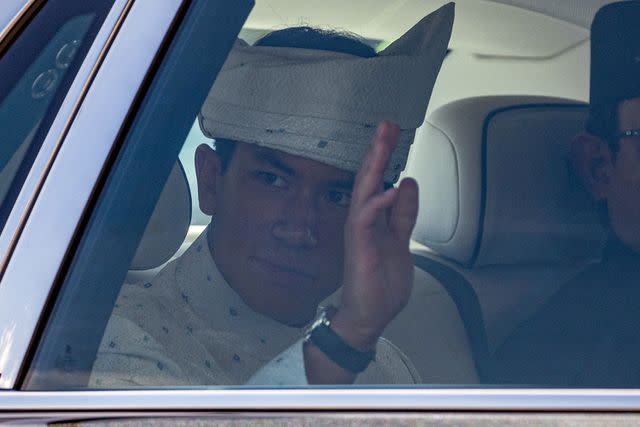 <p>MOHD RASFAN/AFP via Getty Images</p> Prince Abdul Mateen leaves the solemnization ceremony at Sultan Omar Ali Saifuddien Mosque on Jan. 11.