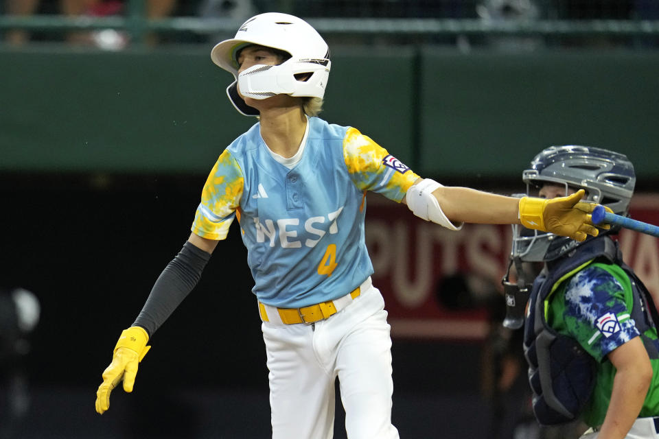 El Segundo, Calif.'s Finley Green (4) follows through on an RBI single off Seattle's Trey Kirchoff during the second inning of a baseball game at the Little League World Series in South Williamsport, Pa., Thursday, Aug. 24, 2023. (AP Photo/Gene J. Puskar)