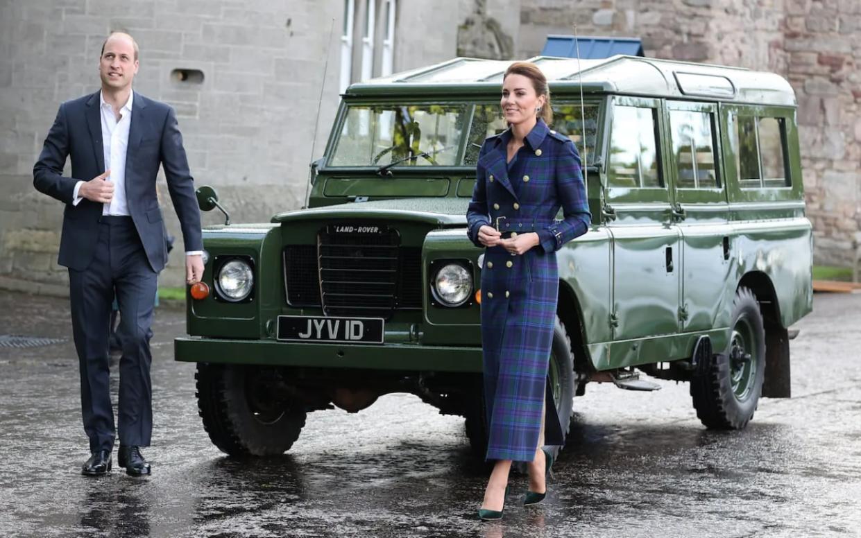 Will and Kate Cambridge with a Land Rover Series 2a that belonged to the late Prince Philip - Chris Jackson