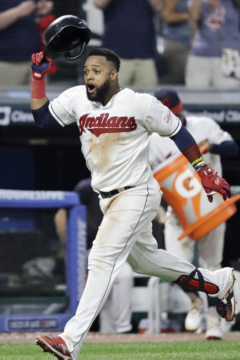 Cleveland Indians' Carlos Santana celebrates after hitting a solo home run in the ninth inning in a baseball game against the Boston Red Sox, Monday, Aug. 12, 2019, in Cleveland. The Indians won 6-5. (AP Photo/Tony Dejak)