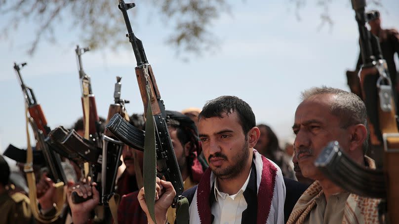 Houthi fighters attend a funeral in Sana'a, Yemen, 24 November 2021