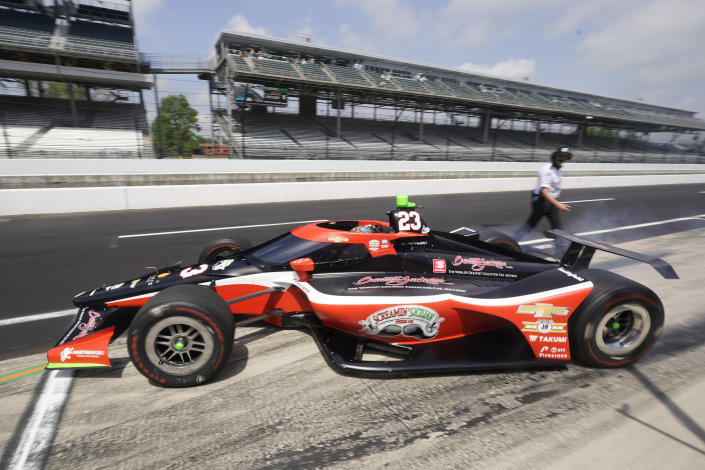 Santino Ferrucci leaves the pits during practice for the Indianapolis 500 auto race at Indianapolis Motor Speedway, Thursday, May 19, 2022, in Indianapolis. (AP Photo/Darron Cummings)