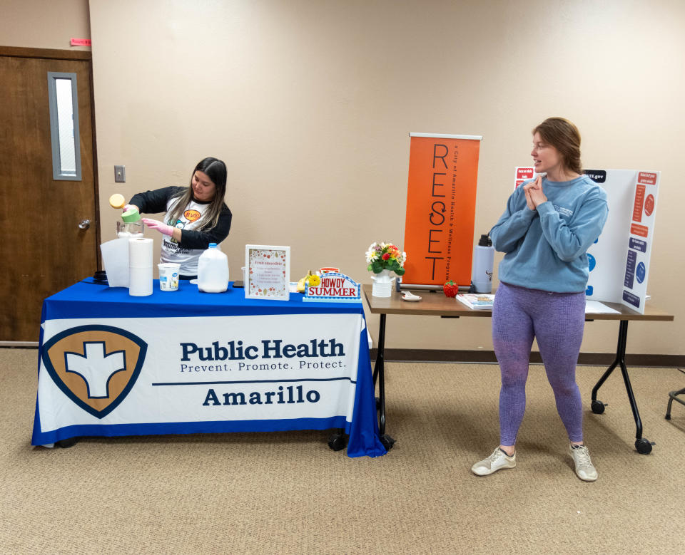 Members of the Amarillo Department of Public Health show an audience a healthy smoothie recipe Saturday at the Spring into Wellness Health Community Health and Resource Fair, held at the Southwest Church of Christ in Amarillo.