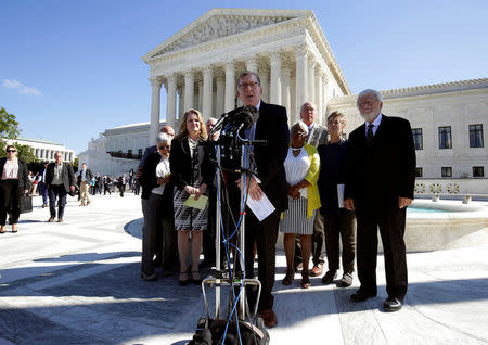 Plaintiff's attorney Paul Smith speaks after oral arguments in Gill v. Whitford, a case about partisan gerrymandering in electoral districts, at the Supreme Court in Washington, U.S., October 3, 2017. REUTERS/Joshua Roberts