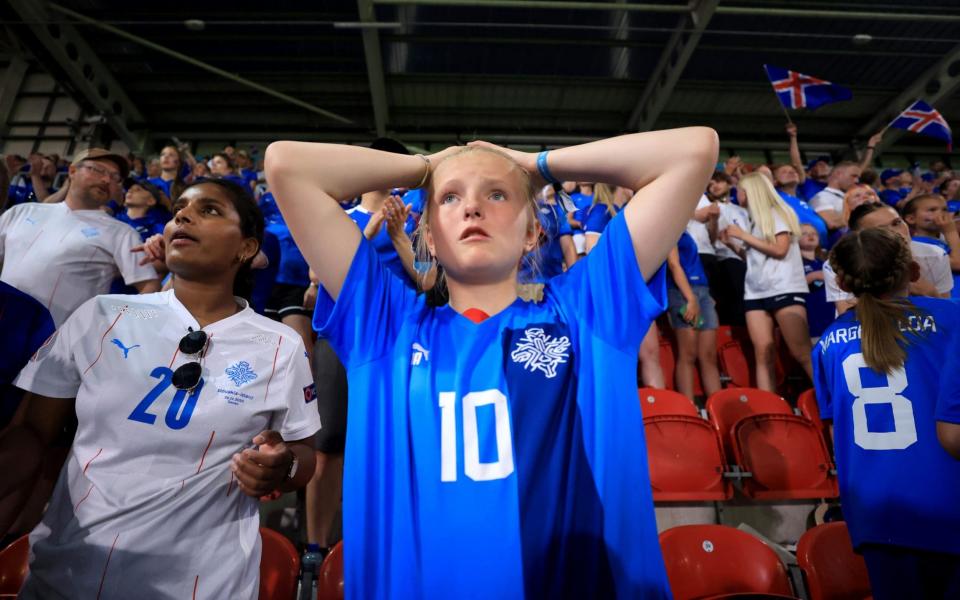 An Iceland fan looks dejected following the UEFA Women's Euro 2022 group D match between Iceland and France at The New York Stadium - Alex Pantling/Getty Images