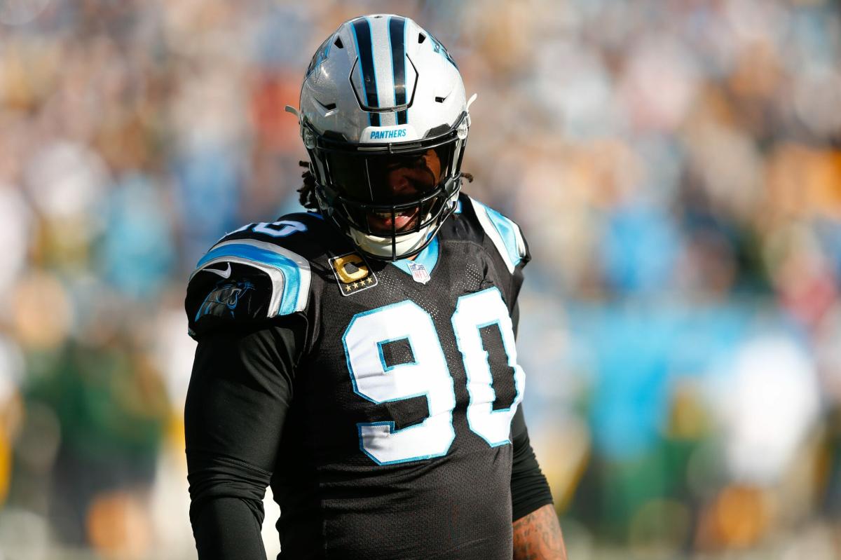 Panthers S Jeremy Chinn reps with Julius Peppers jersey