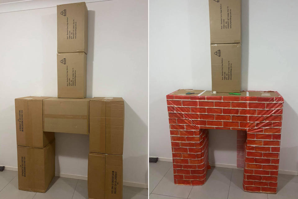 Using seven boxes, the mum was able to create the fireplace and chimney using just one packet of Kmart's Brick Wall Wrap. Photo: Facebook