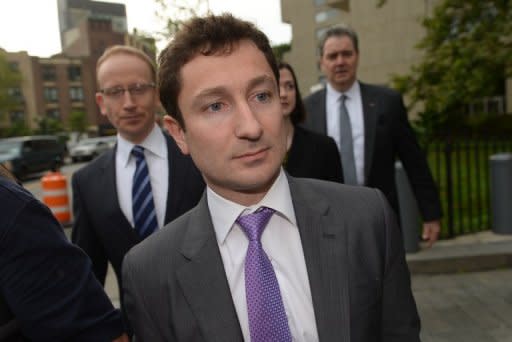 Former Goldman Sachs bond trader Fabrice Tourre arrives at Manhattan federal court with his lawyers in the civil fraud case against him, in New York, August 1, 2013. New York jurors on Thursday found Tourre committed fraud by selling mortgage-linked bonds that were likely to fail