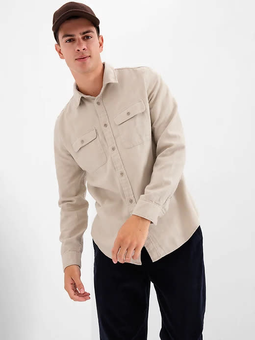 model wears khaki Chamois Shirt. Image via Gap.