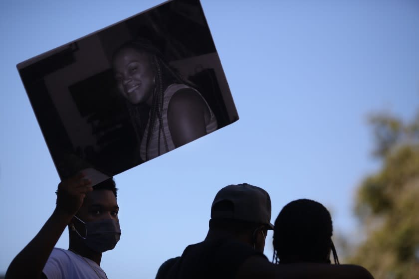 LOS ANGELES, CA - JULY 15: Wakiesha Wilson's family speaks on stage during a Black Lives Matter Rally on their seventh anniversary in downtown on Wednesday, July 15, 2020 in Los Angeles, CA. Wilson became a symbol of the Black Lives Matter movement in Los Angeles as her family and activists chanted her name at Police Commission meetings and demanded to know more about her death. They rejected the idea that Wilson died by suicide, and some said they believed some type of altercation with detention officers was to blame. (Dania Maxwell / Los Angeles Times)