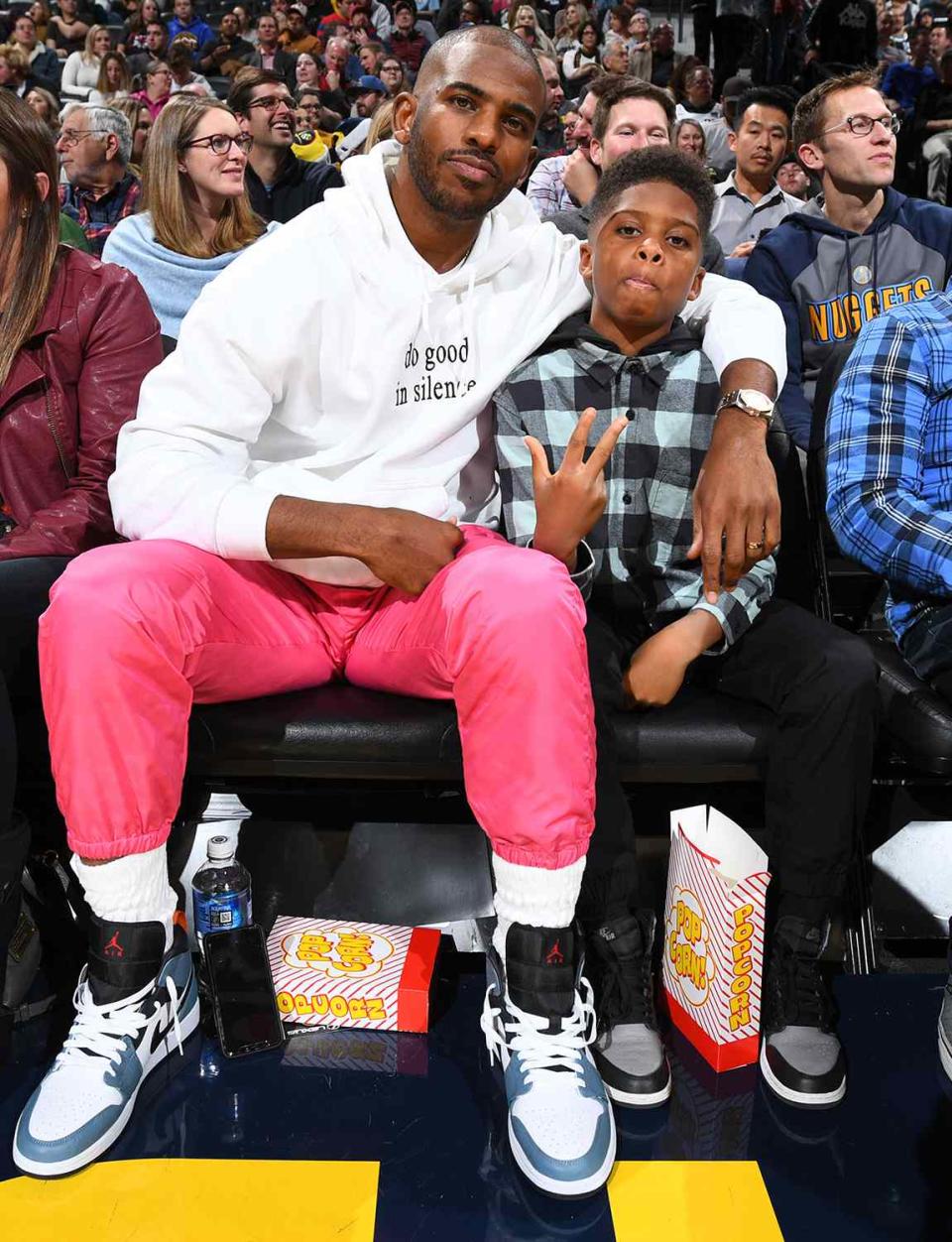 Chris Paul #3 of the Oklahoma City Thunder and Chris Paul Jr. watches the game on December 12, 2019 at the Pepsi Center in Denver, Colorado