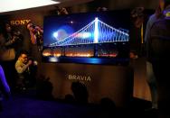 <p>Journalists take photos of a Sony Bravia OLED television with an Acoustic Surface after it was unveiled in a Sony news conference at the 2017 CES in Las Vegas, Nevada January 4, 2017. The Acoustic Surface sound technology is new; Sony says the “entire screen resonates with rich sound emanating directly from the screen itself.” (Reuters) </p>