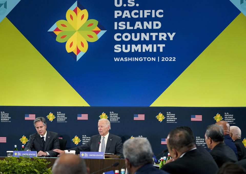 President Joe Biden speaks during the first U.S.-Pacific Island Country Summit at the State Department in Washington, Thursday, Sept. 29, 2022. Secretary of State Antony Blinken listens at left. (AP Photo/Susan Walsh)