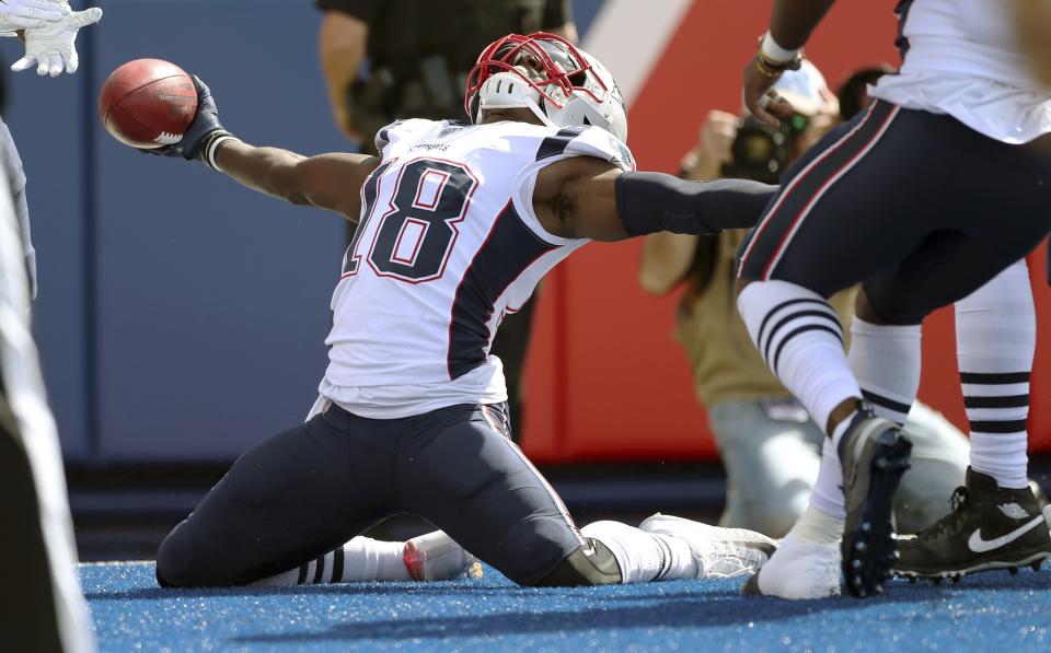 New England Patriots' Matthew Slater celebrates his touchdown after recovering a blocked punt in the first half of an NFL football game against the Buffalo Bills, Sunday, Sept. 29, 2019, in Orchard Park, N.Y. (AP Photo/Ron Schwane)