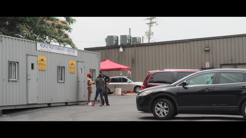 The converted shipping container that houses People Trust.