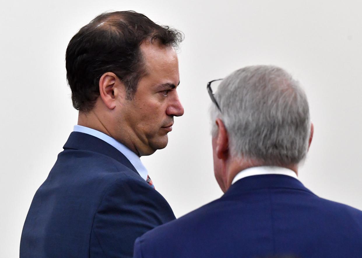 Attorneys for Johns Hopkins All Children's Hospital, Ehten Shapiro, left, and C. Howard Hunter, right confer during proceedings in court Tuesday, Oct. 3, 2023 at the South County Courthouse in Venice, Florida. The Kowalski family is suing Johns Hopkins All Children's Hospital for false imprisonment, negligent infliction of emotional distress, medical negligence, battery, and other claims more than a year after the family matriarch, Beata Kowalski, took her life following allegations she was abusing her daughter, Maya Kowalski. Pool photo/Mike Lang/Sarasota Herald-Tribune