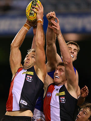 Beau Maister of the Saints marks the ball during the round nine AFL match between the St Kilda Saints and the Western Bulldogs at Etihad Stadium on May 25, 2013 in Melbourne, Australia.