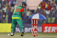 Bangladesh’s Anamul Haque looks back on his stumps after being bowled out by India’s Varun Aaron during the Asia Cup one-day international cricket tournament in Fatullah, near Dhaka, Bangladesh, Wednesday, Feb. 26, 2014. (AP Photo/A.M. Ahad)