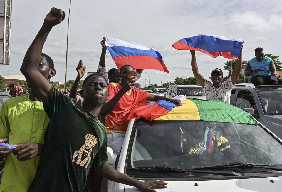 Thousands of supporters of the military coup in Niger gathered at a Niamey stadium Sunday, when a deadline set by the West African regional bloc ECOWAS to return the deposed President Mohamed Bazoum to power is set to expire, according to AFP journalists. (AFP - Getty Images)