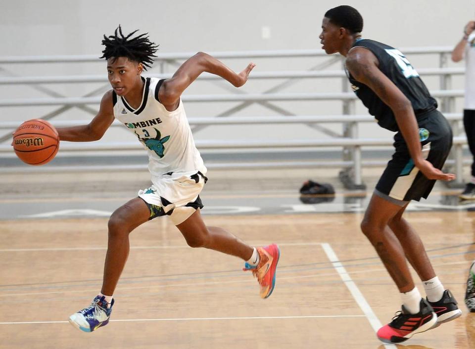 Combine Academy guard Robert Dillingham, left, pushes the ball upcourt during a practice game at Combine Academy in Lincolnton, NC on Wednesday, October 21, 2020.