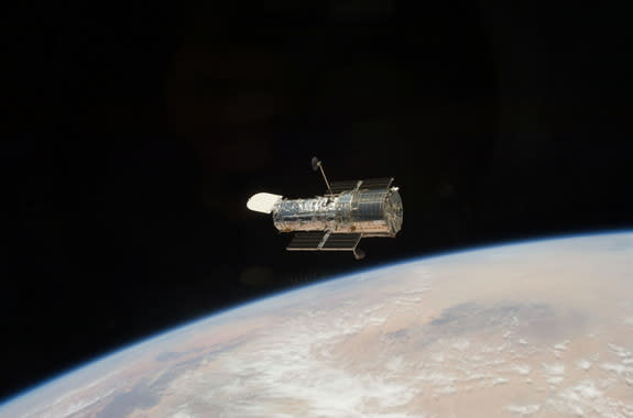 NASA's Hubble Space Telescope, which launched aboard the space shuttle Discovery on April 24, 1990, is shown here in an astronaut photo.