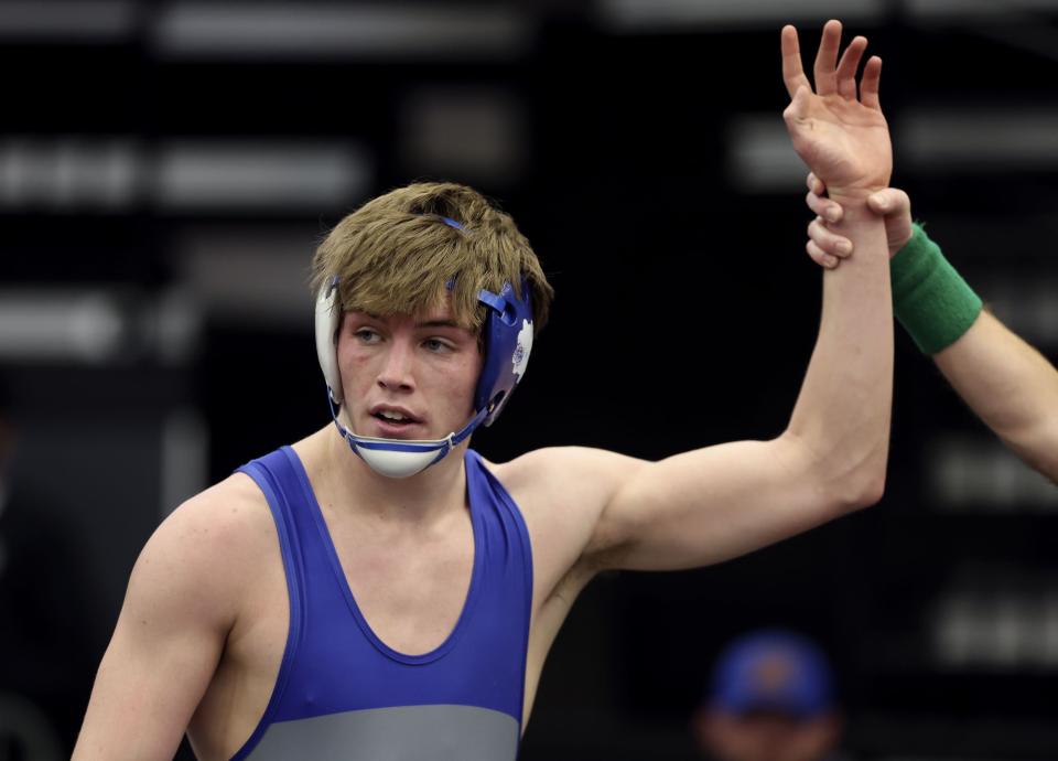 Fremont’s Logan Hancey is declared the winner in the 6A Wrestling State Championships at the UCCU Center in Orem on Friday, Feb. 16, 2024. | Laura Seitz, Deseret News