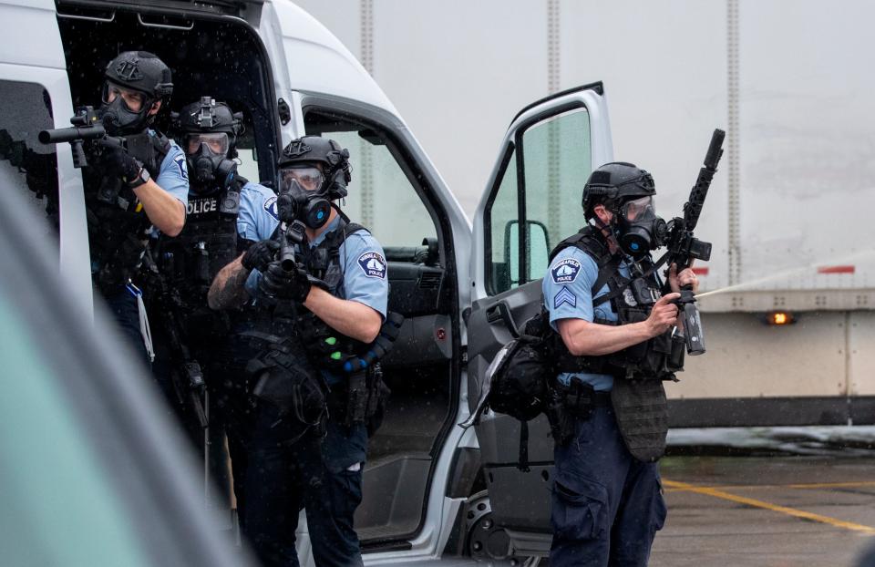 Police descend upon the protest (AP)