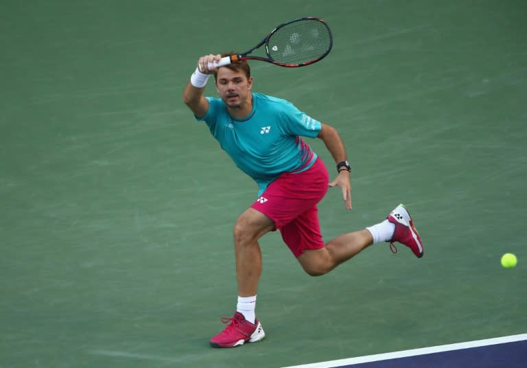 Stan Wawrinka of Switzerland plays a forehand against Philipp Kohlschreiber of Germany during their BNP Paribas Open third round match, at Indian Wells Tennis Garden in California, on March 13, 2017