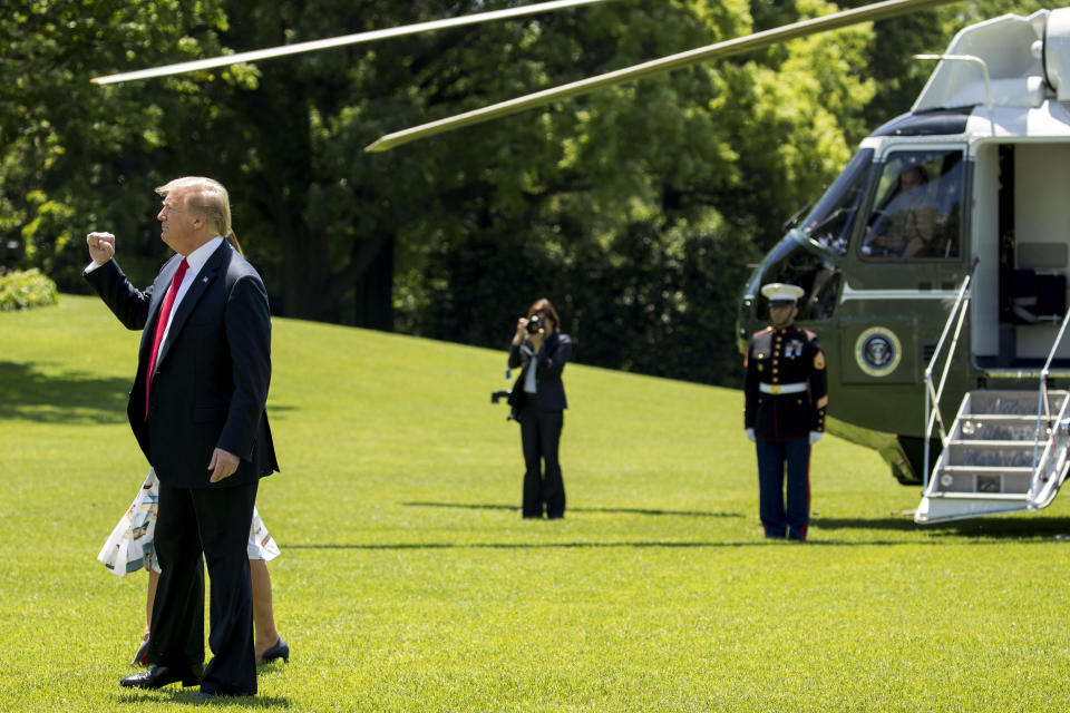 President Donald Trump pumps his fist to supporters on the South Lawn of the White House in Washington, Friday, May 24, 2019, before boarding Marine One for a short trip to Andrews Air Force Base, Md, and then on to Tokyo. (AP Photo/Andrew Harnik)