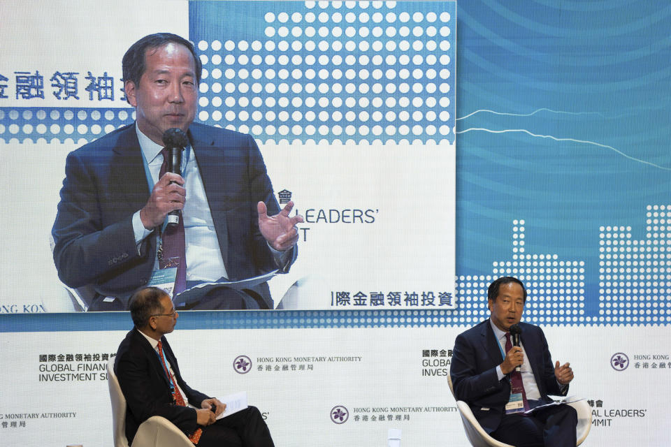 Chief Financial Officer and Senior Managing Director of Blackstone Michael Chae, right, speaks during the Global Financial Leaders' Investment Summit in Hong Kong, Wednesday, Nov. 2, 2022. Chinese regulators downplayed China's real estate slump and slowing economic growth while Hong Kong's top leader pitched Hong Kong as a unique link to the rest of China at a high-profile investment summit Wednesday. (AP Photo/Bertha Wang)