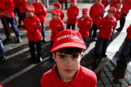 Members of firefighter school attend a training session in Oliveira do Hospital, Portugal November 10, 2018. Picture taken November 10, 2018. REUTERS/Rafael Marchante