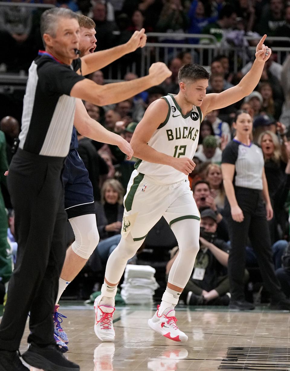 Bucks guard Grayson Allen heads back on defense after hitting one of his 7 three-pointers on the night against the Mavericks on Sunday.