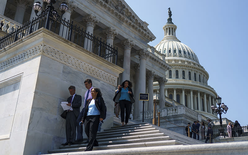 Members of the House leave the Capitol following the last vote