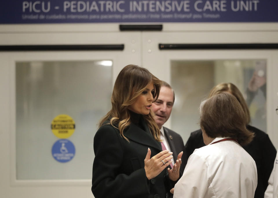 First lady Melania Trump, left, speak with pediatrician Eileen Costello, front right, as U.S. Secretary of Health and Human Services Alex Azar, behind center, looks on during a visit to Boston Medical Center, in Boston, Wednesday, Nov. 6, 2019. The visit, part of the first lady's "Be Best" initiative, included the hospital's pediatric intensive care unit. (AP Photo/Steven Senne, Pool)