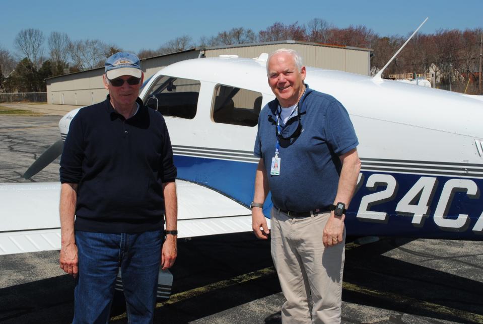 South Shore Flying Club directors Steve Rusconi, left, and Karl Swenson are avid pilots.