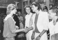 <p>The members of Duran Duran dressed like their typical '80s selves to meet Princess Diana at the Prince's Trust Rock Gala. Simon Le Bon (center) opted for white pants, a crew neck t-shirt, and a white blazer—with the sleeves rolled up, of course. </p>