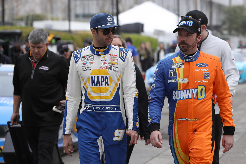 LOS ANGELES, CALIFORNIA - FEBRUARY 03: Chase Elliott, driver of the #9 NAPA Auto Parts Chevrolet, (L) and Josh Berry, driver of the #4 SunnyD Ford, talk during practice for the NASCAR Cup Series Busch Light Clash at The Coliseum at Los Angeles Memorial Coliseum on February 03, 2024 in Los Angeles, California. (Photo by Meg Oliphant/Getty Images)