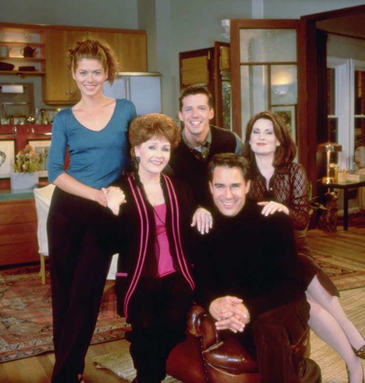 Reynolds with Debra Messing, Sean Hayes and Megan Mullally on the set of Will and Grace. Photo: Getty Images