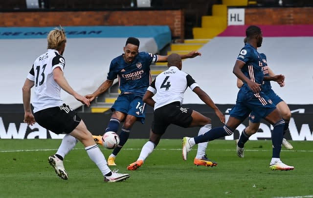 Pierre-Emerick Aubameyang scores Arsenal's third goal in his side's 3-0 win against Fulham at Craven Cottage