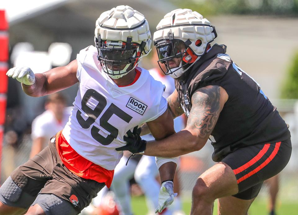 Cleveland Browns defensive end Myles Garrett bets past left tackle Jedrick Wills during training camp on Saturday, July 30, 2022 in Berea.