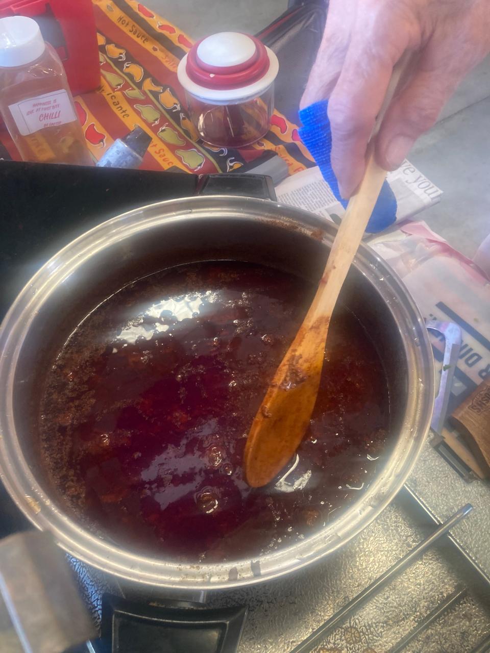 Les Eastep of Springfield stirs his traditional red chili at Sunday's Illinois State Fair Chili Cookoff at The Shed. Eastep's win in the homestyle category reserved him a spot in the World Championship Chili Cook-off in Myrtle Beach, South Carolina, in 2024.
