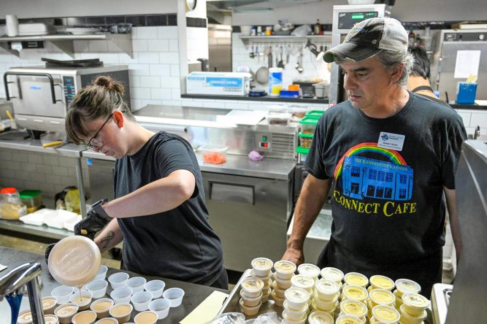 Madisson Page, 24, prepared condiments for the lunch rush alongside Randy Ross.