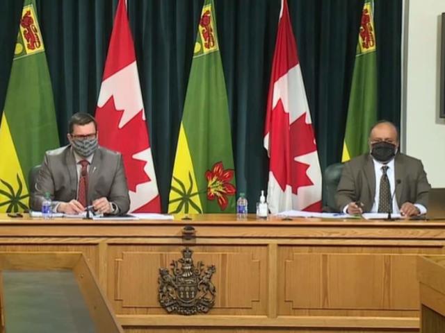 Dr. Saqib Shahab, Saskatchewan&#39;s chief medical health officer, right, and Health Minister Paul Merriman, left, are shown at a previous news conference. On Thursday, they updated pandemic protocols in Saskatchewan. (CBC - image credit)