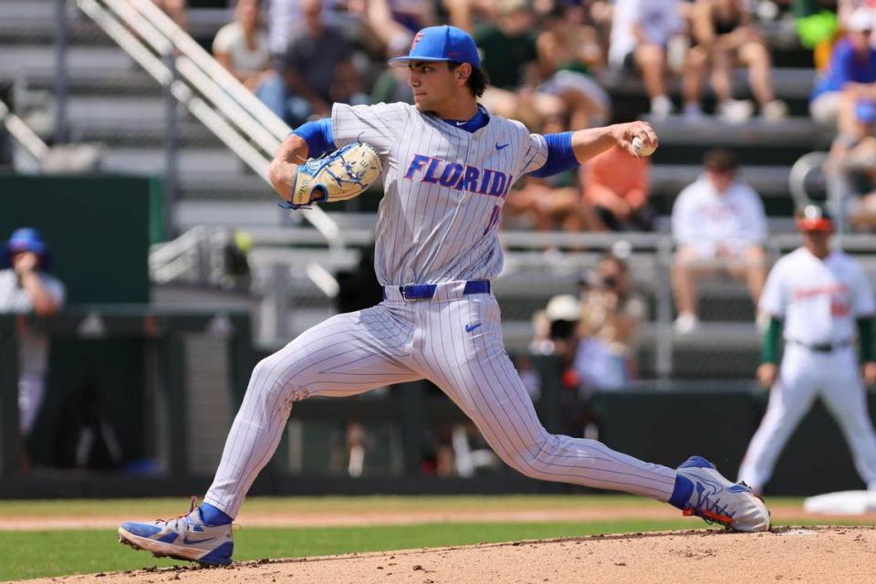 Florida Gators starting pitcher Jac Caglianone (14) delivers a pitch against the Miami Hurricanes during the first inning at Alex Rodriguez Park at Mark Light Field in Coral Gables, Florida, Sunday, March 3, 2024.