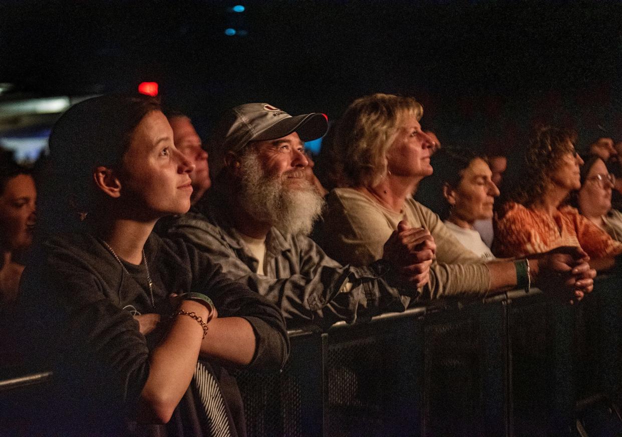 Stage AE fans watching The Decemberists.
