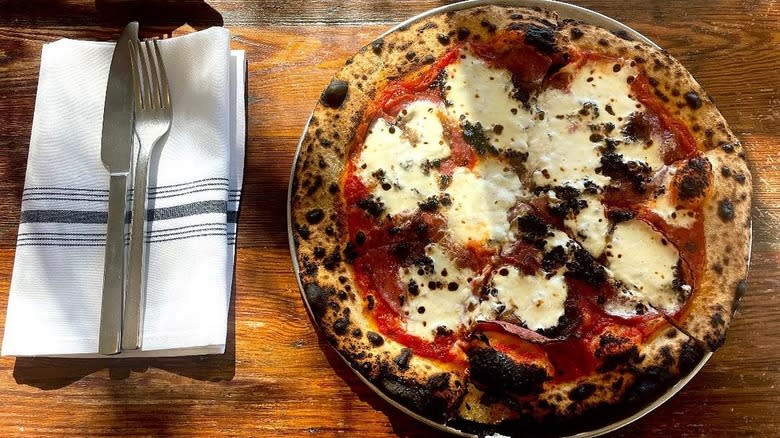 Margherita pizza on table