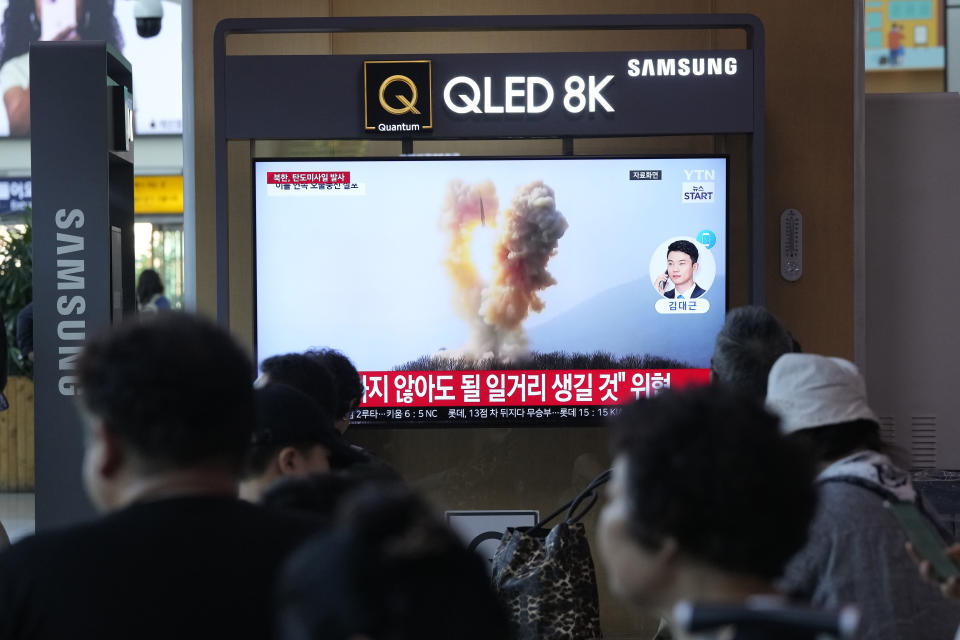 A file image of a missile launch by North Korea is shown during a news program, at Seoul Railway Station in Seoul, South Korea, Wednesday, June 26, 2024. North Korea fired a ballistic missile toward its eastern waters on Wednesday, South Korea's military said, in an apparent protest of the recent regional deployment of a U.S. aircraft carrier for a new trilateral military drill with South Korea and Japan. (AP Photo/Ahn Young-joon)